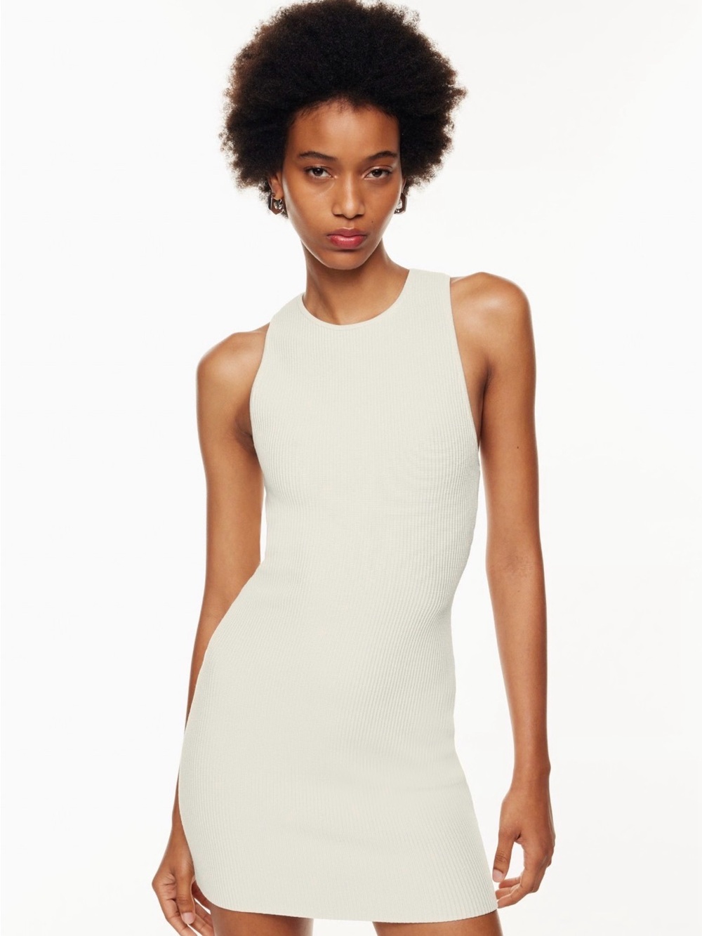 Babaton’s sleeveless ribbed mini dress in cream.